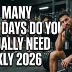 Realistic YouTube thumbnail featuring a fit person relaxing on a rest day with workout gear nearby, with bold text “How Many Rest Days Do You Actually Need Weekly 2026” in a bold, high-contrast fitness design.